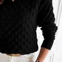 Schwarzer Damenpullover mit Strukturmuster, langärmelig, modisch, elegant, aus Baumwolle.