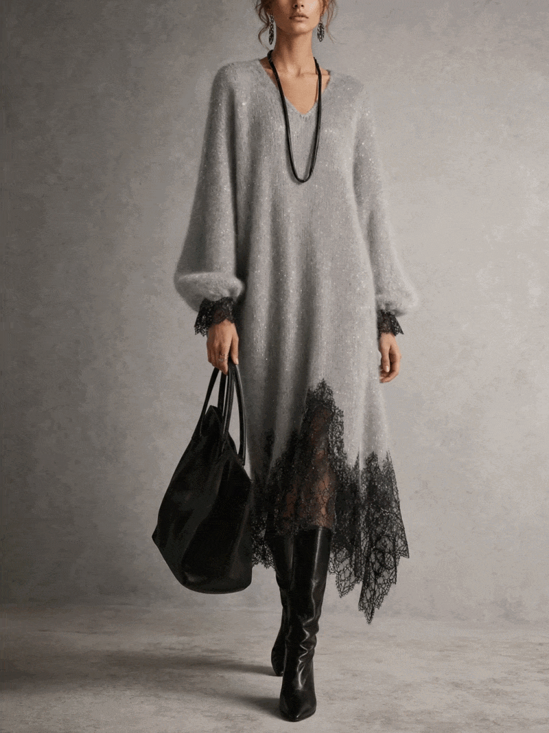 Ganzkörperansicht des grauen Strickkleids von vorn mit Puffärmeln, Spitzenärmelbündchen und asymmetrischem Spitzensaum 2