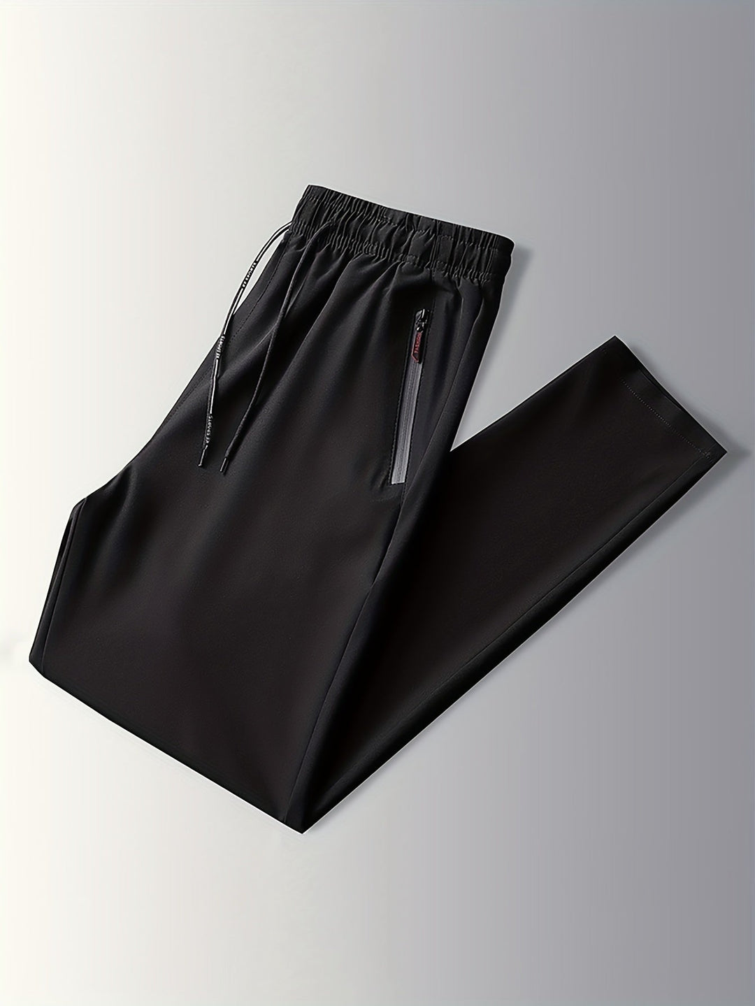 Solid-colored jogging pants with zipper details - Milan