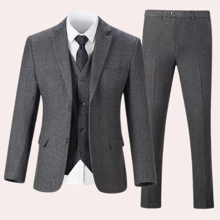 Grauer Herrenanzug dreiteilig, Sakko, Weste, Hose, formell, Business, elegant, klassisch.