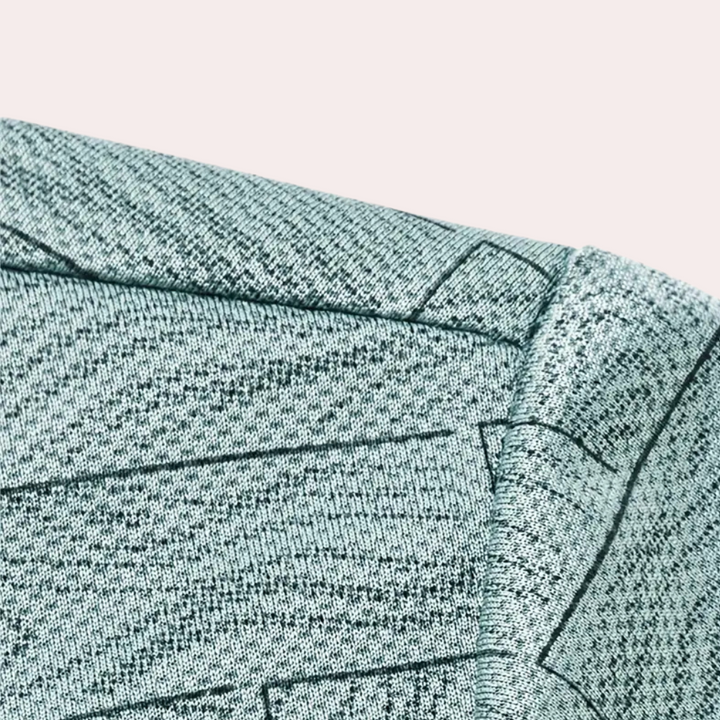 Graues Strickgewebe mit geometrischem Muster, Detailansicht, Textil, Stoffdesign.