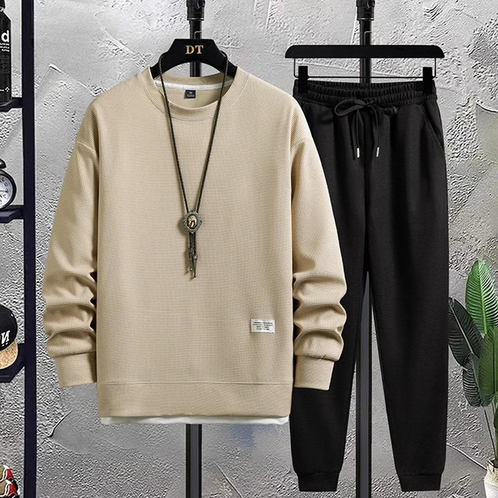 Herren Jogginganzug beige Pullover schwarze Hose, Freizeitmode, bequem, modern, Baumwolle.