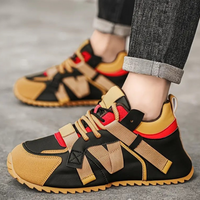 Schwarze und beige Sneaker mit rotem Akzent, sportlich, modisch, Unisex, Straßenschuhe.