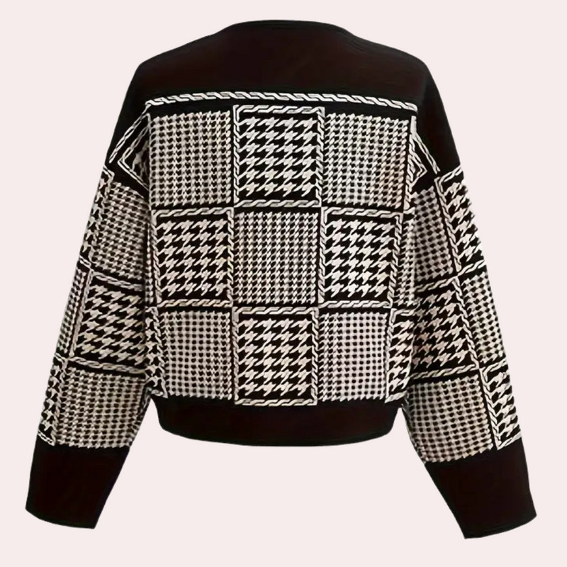 Schwarz-weißer Hahnentritt-Pullover, Damenmode, Strick, geometrisches Muster, Herbstkleidung.
