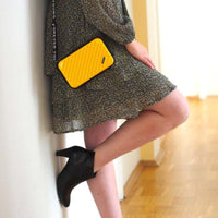 Compact hard-shell travel handbag