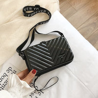 Compact hard-shell travel handbag