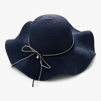 Airy women's beach hat with bow and UV protection – BreezeBow