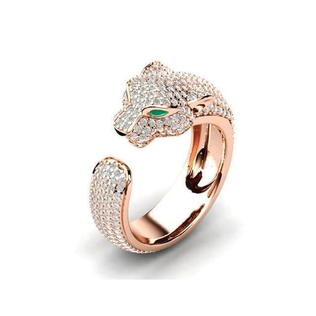 Justerbar ring i 18K sølv og rosaguld med grønne zirkonia-øjne – Jaguar Ring™