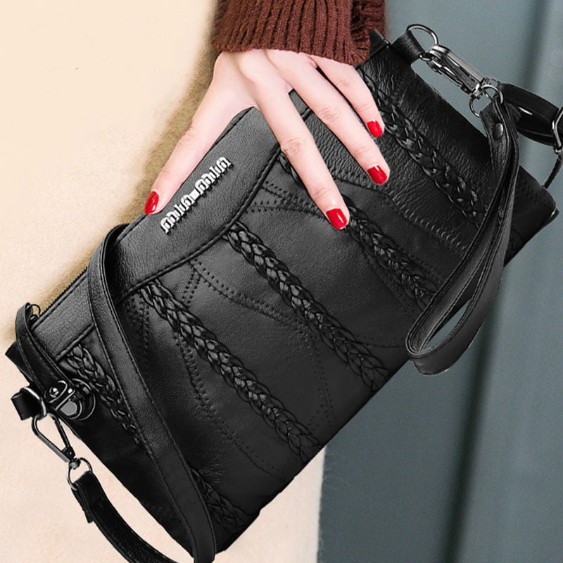 PU leather women's crossbody clutch with spacious interior