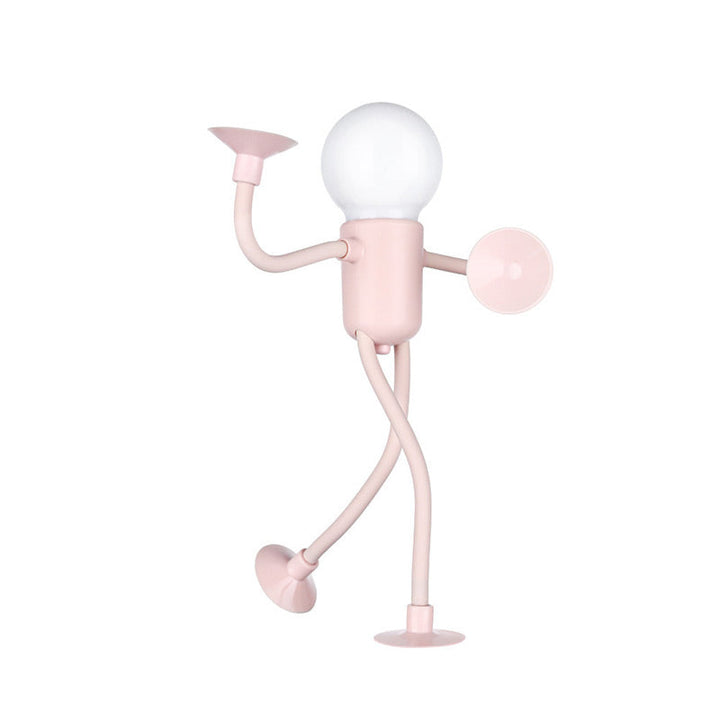 Rosa Figurenlampe mit Kugelkopf in Tanzpose, ein Bein angehoben, Saugnäpfe an Händen und Füßen, freigestellt auf weißem Hintergrund. 3