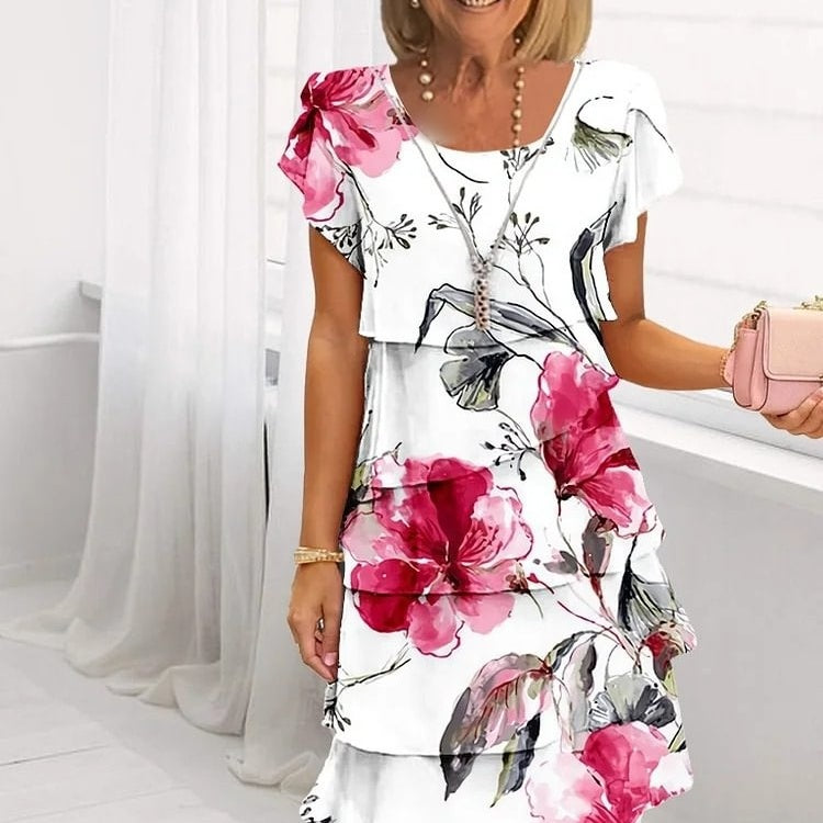 Blomstret sommerkjole med vannfall og justerbare stropper – Leona