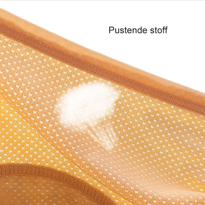 Nahaufnahme des gelb-orangen Mesh-Stoffs mit kleinen Löchern und einer Grafik, die die Luftdurchlässigkeit andeutet. 10