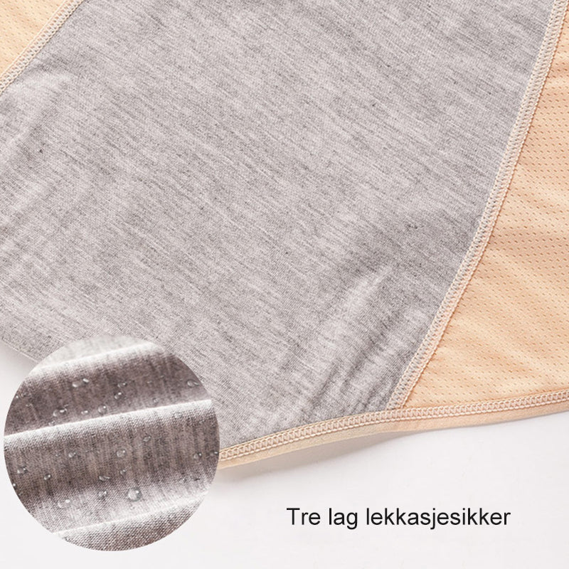 Innenansicht des beigen Slips mit grauem Saugeinsatz, ein Ausschnitt zeigt Wassertropfen auf dem Stoff. 12