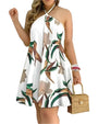 Rückenfreies Sommerkleid mit tropischem Print und Halterneck - InselTraum