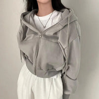 Damevest kort skåret med hætte og oversized pasform – Rinette