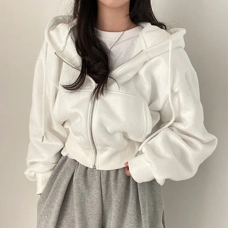 Damevest kort skåret med hætte og oversized pasform – Rinette
