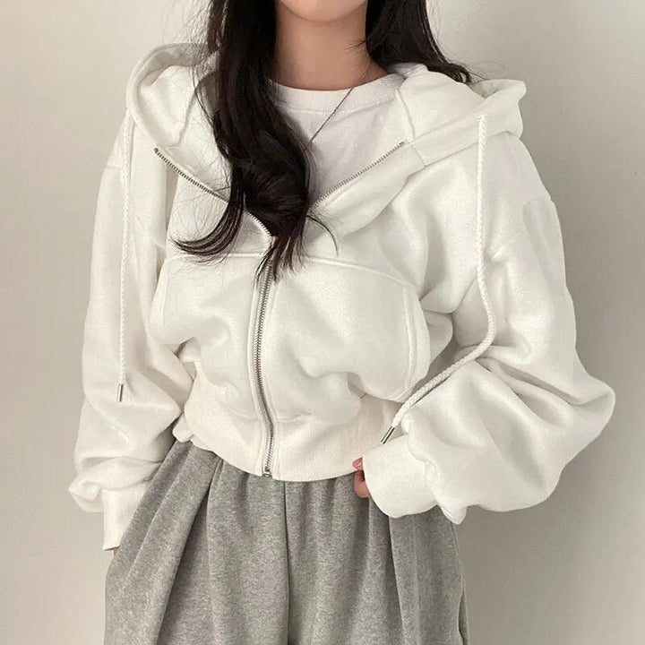 Damevest kort skåret med hætte og oversized pasform – Rinette