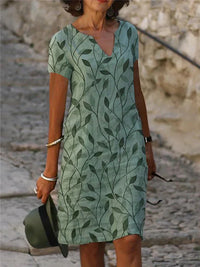 Bezauberndes Kleid mit zauberhaftem Design in Smaragdgrün - GrüneAura