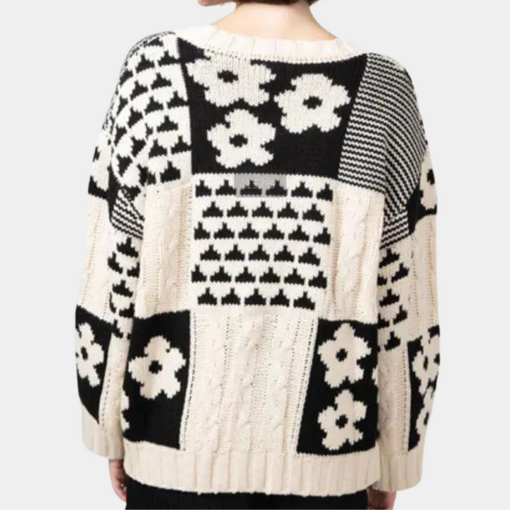 Schwarz-weißer Strickpullover mit Blumenmuster, Patchwork-Design, Damenmode, Herbst/Winter.